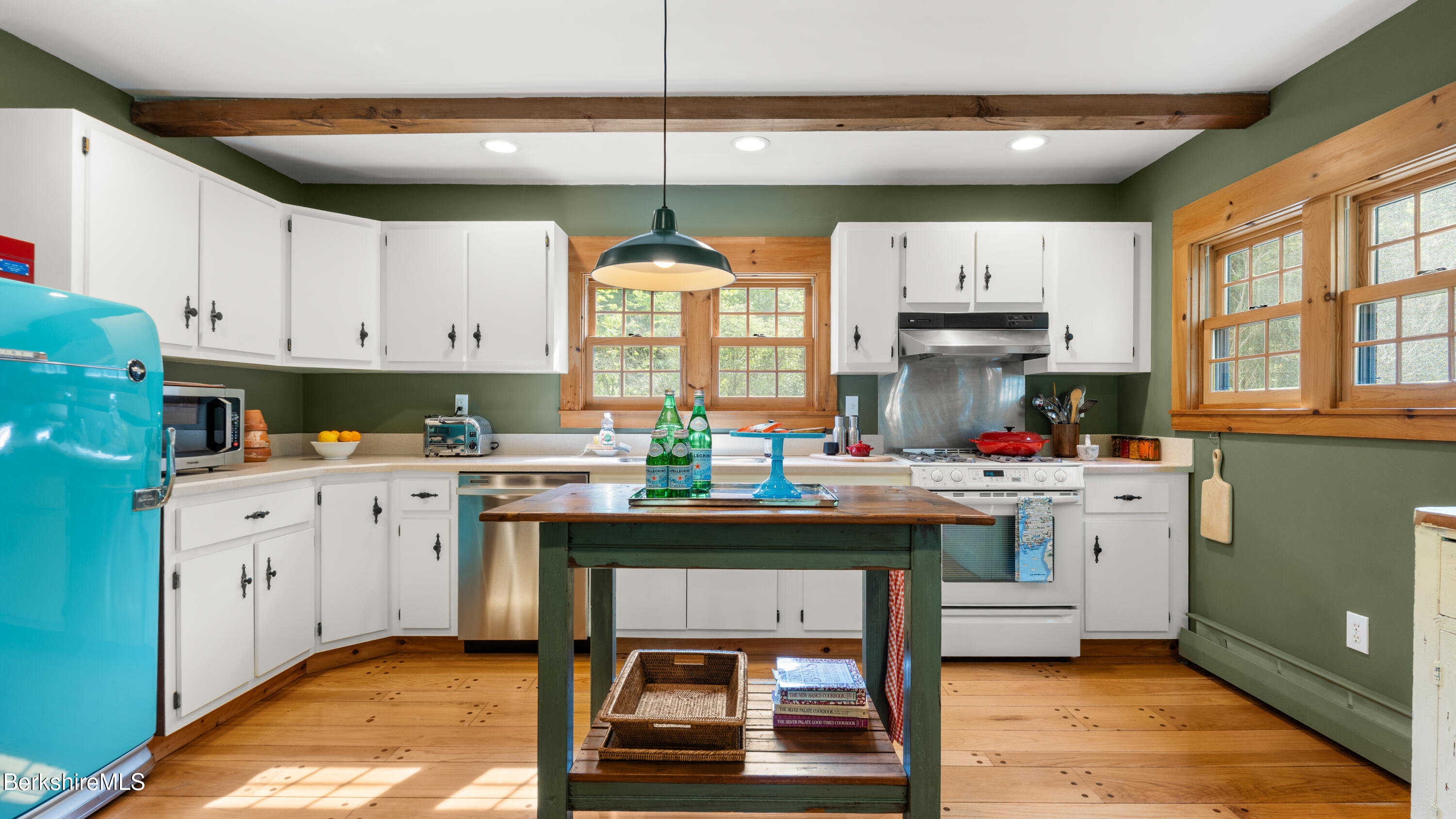 137 E Road Alford, MA 01266 - Photo 4 of 32 a kitchen with kitchen island granite countertop a sink stove and cabinets