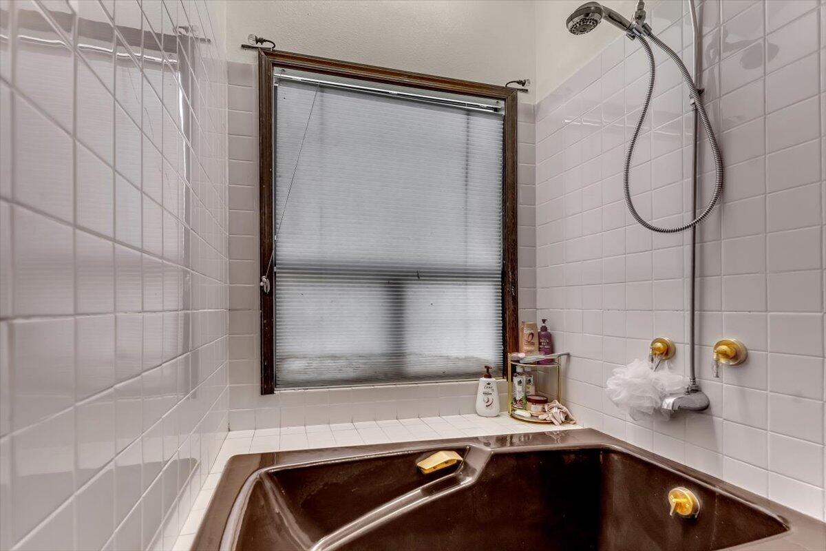 13160 Bear Mountain Road Redding, CA 96003 - Photo 17 of 40 a bathroom with a sink and a mirror