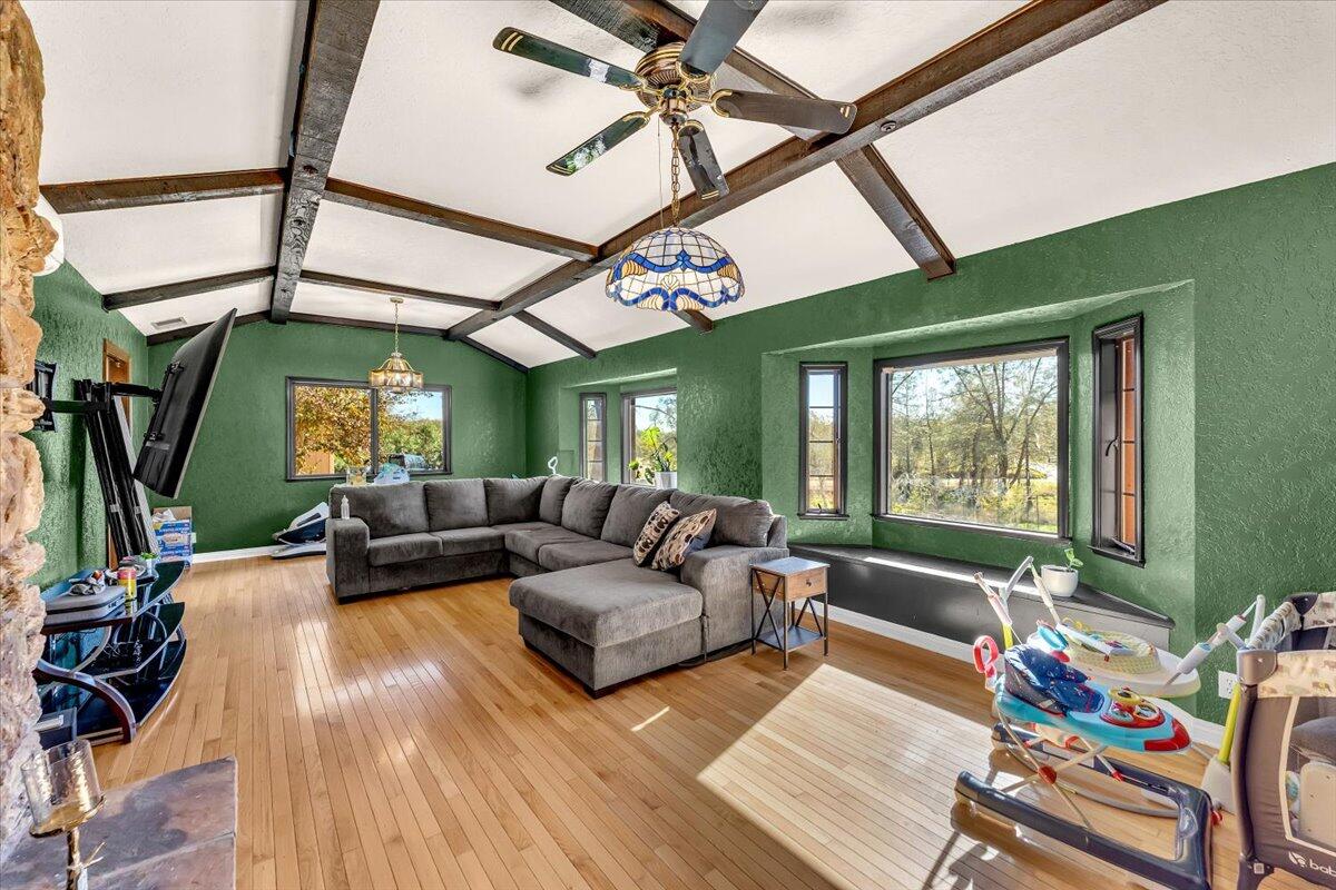 13160 Bear Mountain Road Redding, CA 96003 - Photo 33 of 40 a living room with furniture and a large window
