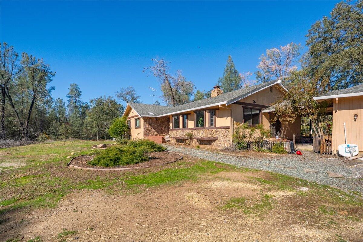 13160 Bear Mountain Road Redding, CA 96003 - Photo 6 of 40 a view of a house with a yard