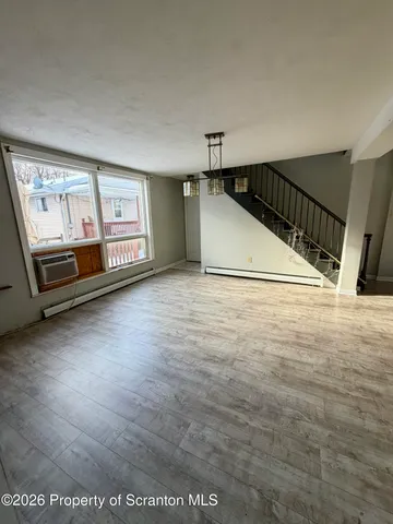 a view of a room with an empty space