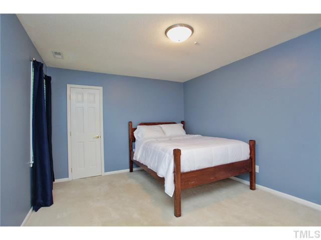 220 Bayleaf Drive Raleigh, NC 27615 - Photo 15 of 25 This picture does not do the room size justice. It is 11.3 x 15 feet and has a walk-in closet. Bedroom