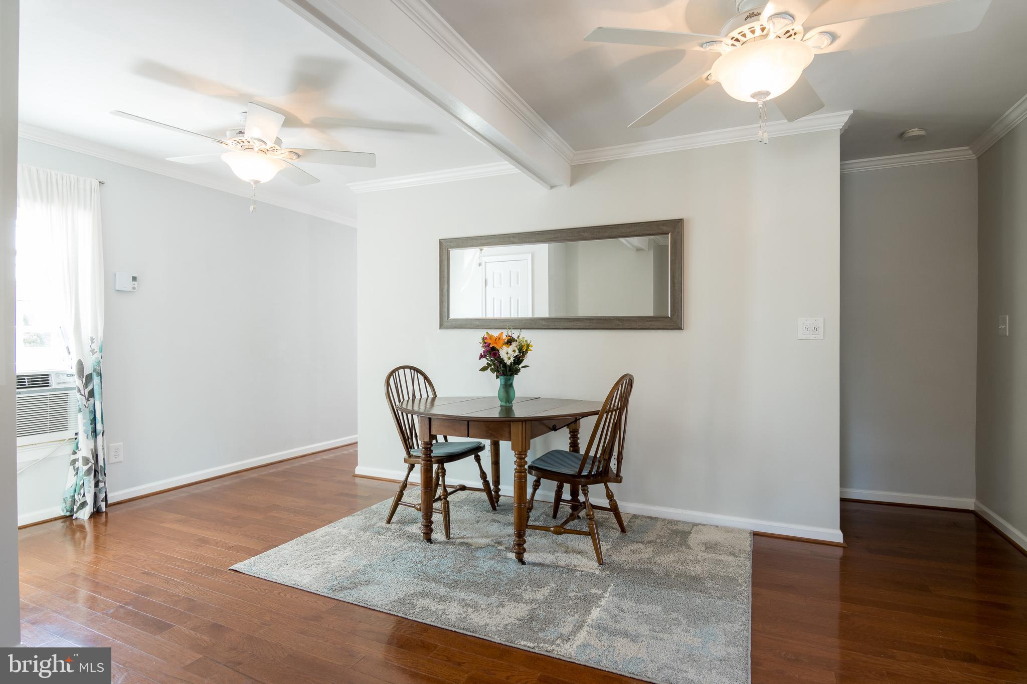 1416 Fairmount Road Hampstead, MD 21074 - Photo 7 of 32 Dining Room with hardwood floors, fans & a/c unit