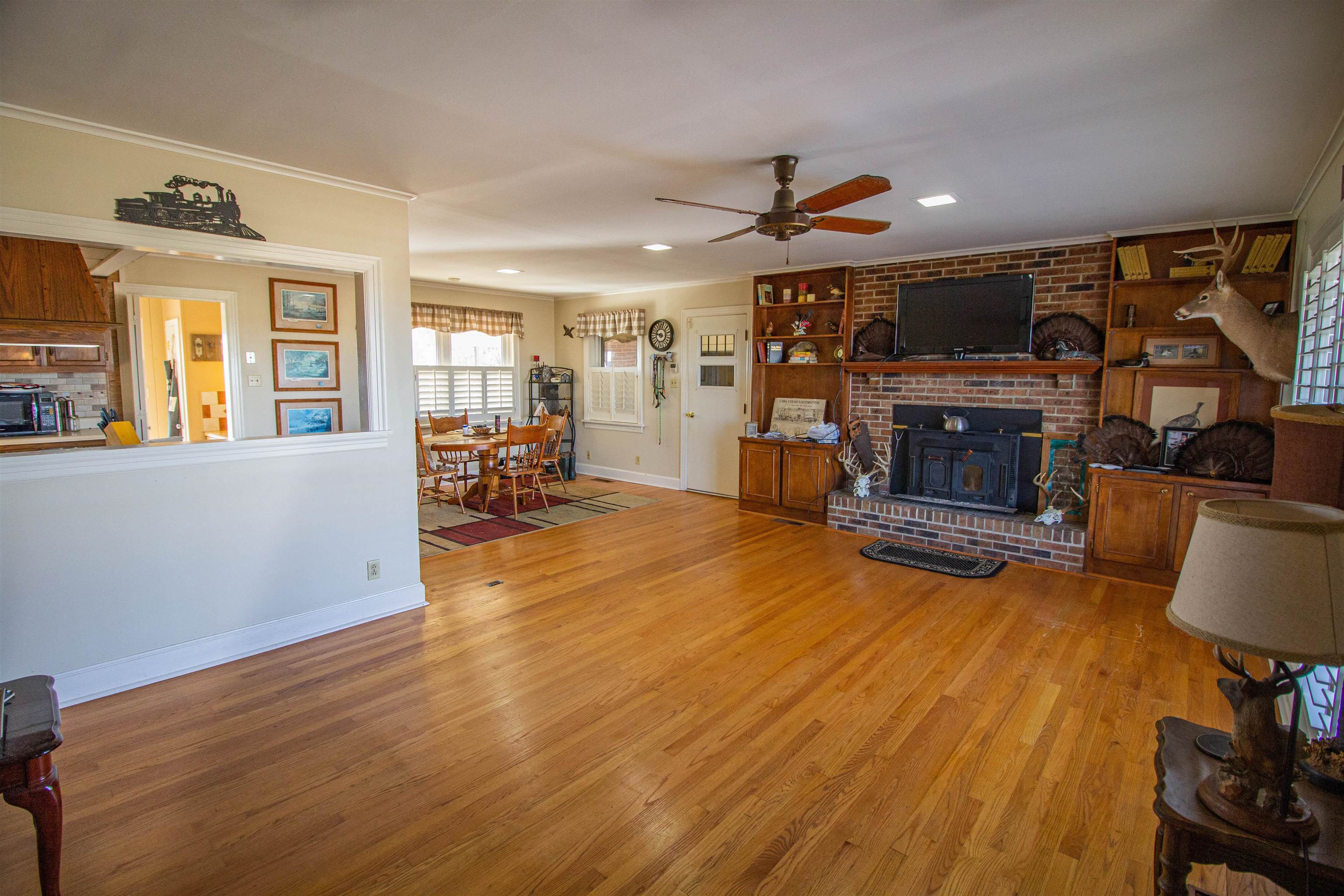 27 Joe Stephens Road Ripley, TN 38063 - Photo 6 of 25 a view of a livingroom with furniture and a fireplace