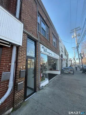 a view of a building with a street