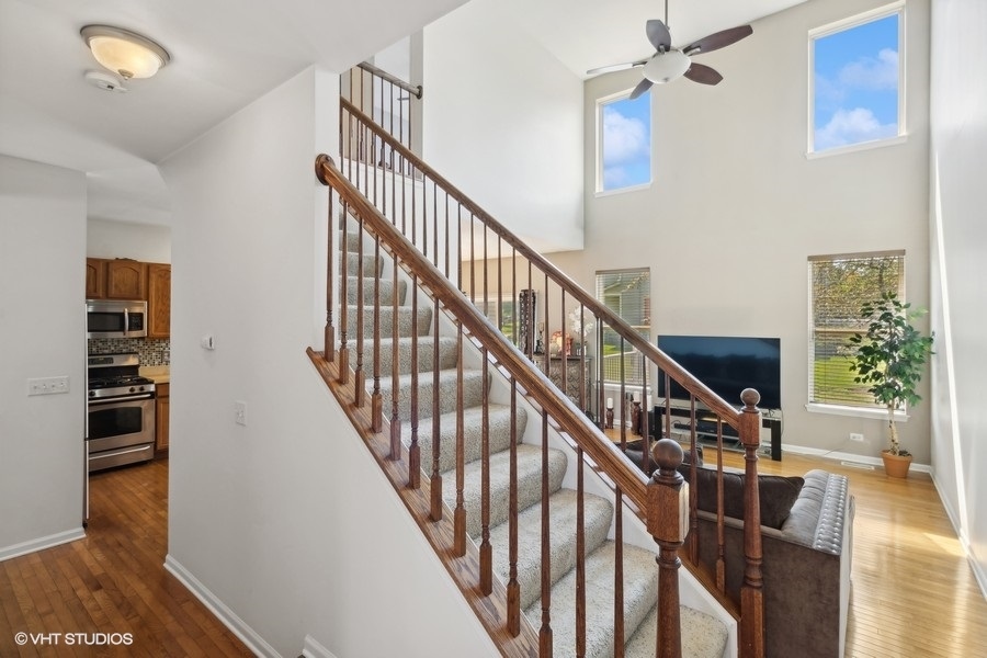 990 Oak Ridge Boulevard Elgin, IL 60120 - Photo 3 of 19 a view of entryway and hall with wooden floor