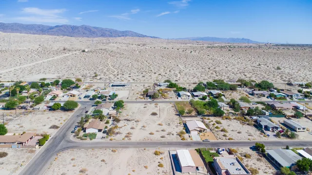 a view of balcony with wooden floor