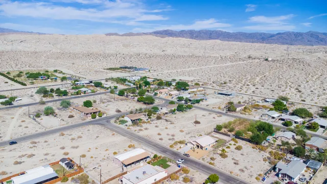 an aerial view of beach and city