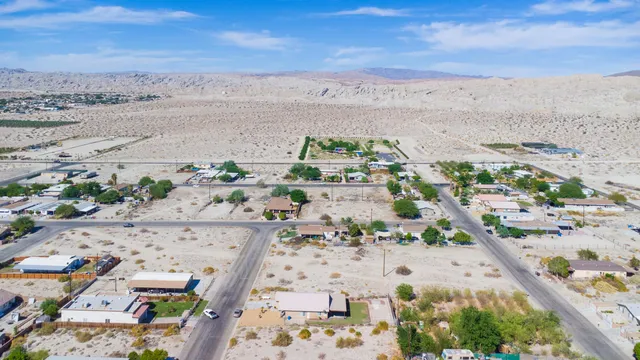 an aerial view of beach and city