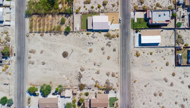 an aerial view of a house with a outdoor space