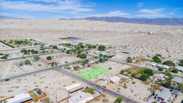 a view of balcony with wooden floor