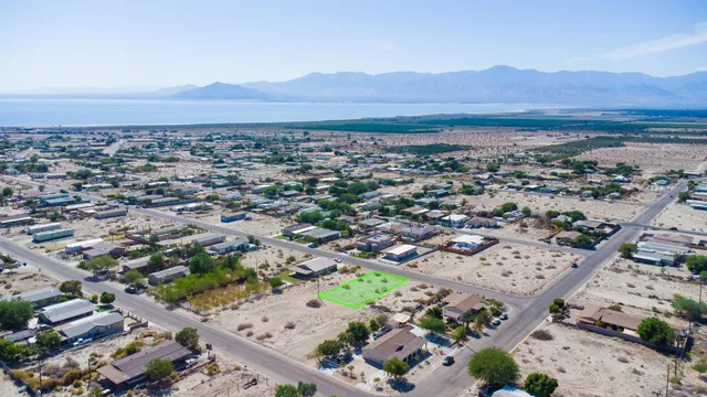 an aerial view of residential house and outdoor space