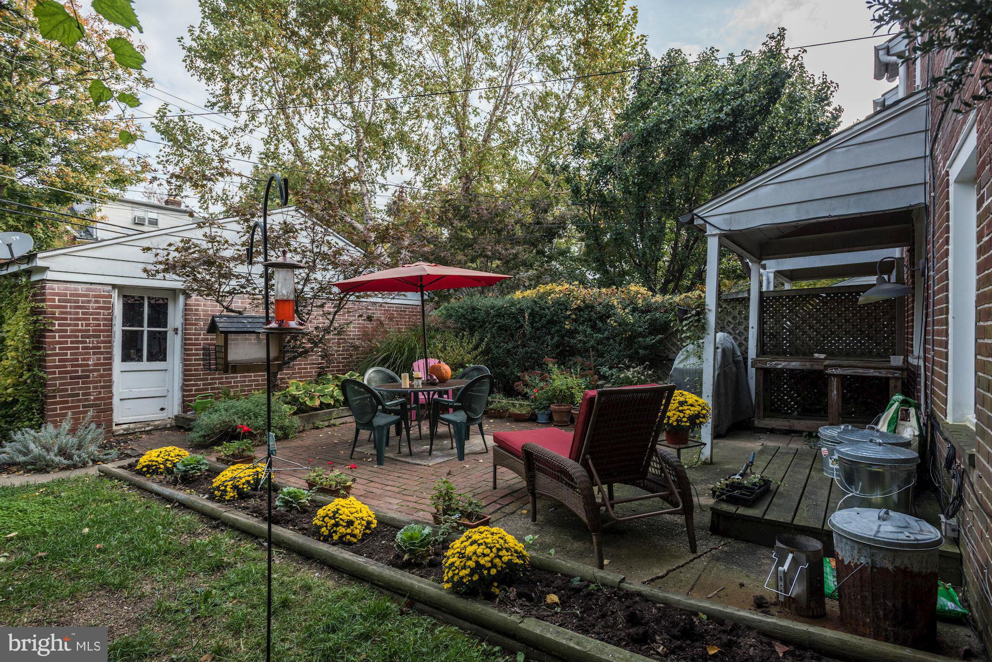 408 Hopkins Road Baltimore, MD 21212 - Photo 24 of 27 a view of backyard with outdoor seating and plants