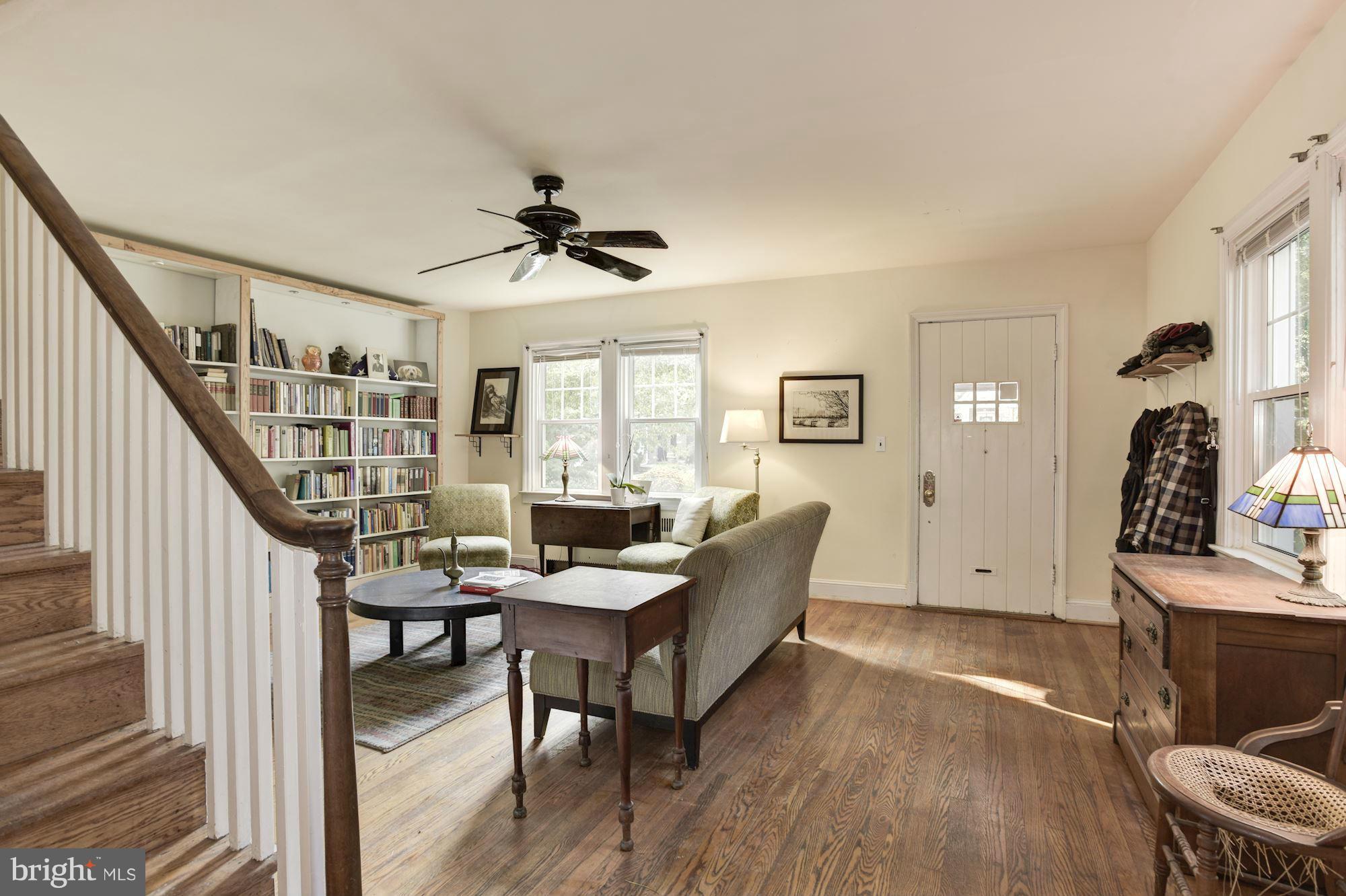 408 Hopkins Road Baltimore, MD 21212 - Photo 5 of 27 a living room with furniture and a wooden floor