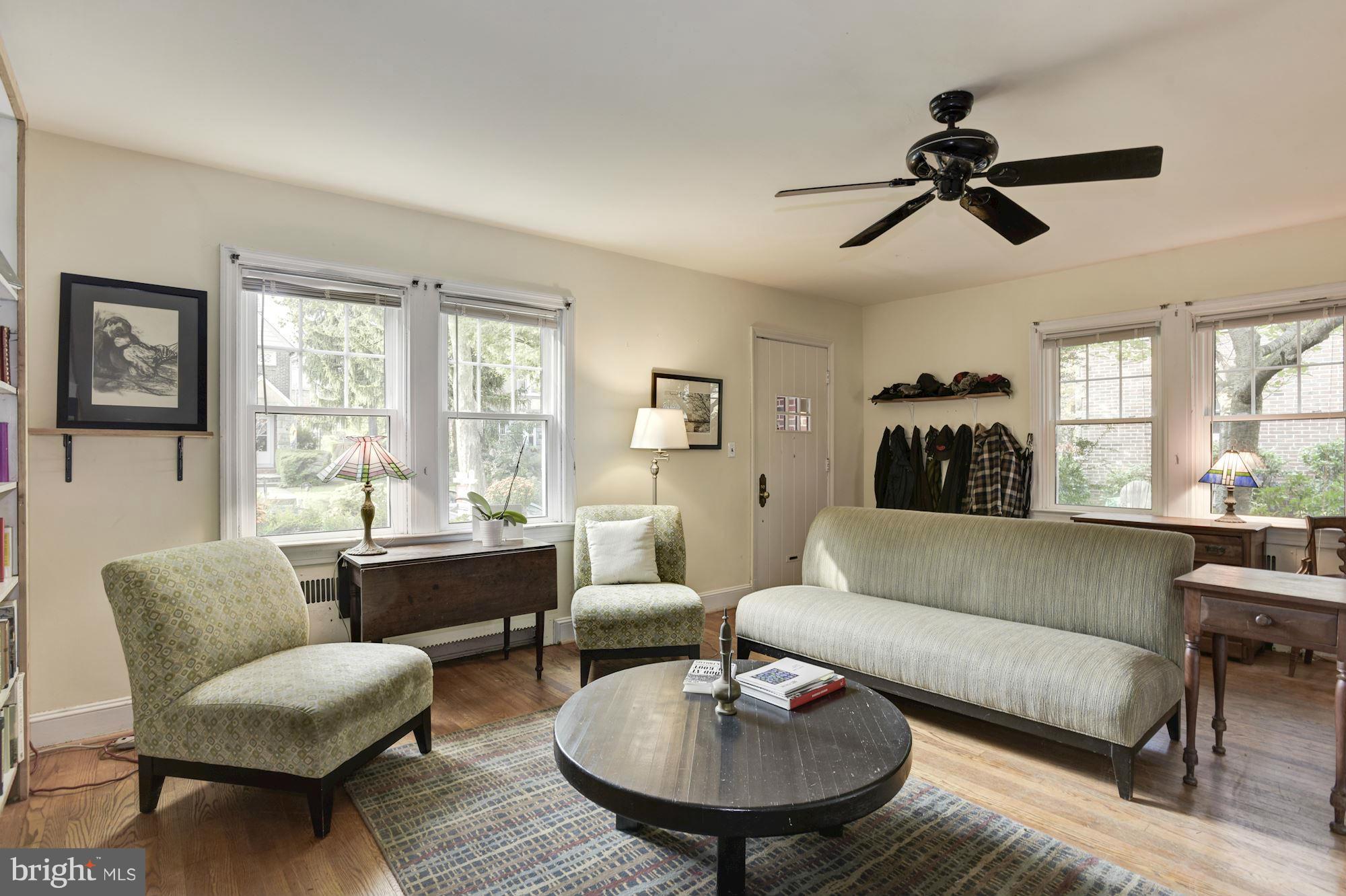 408 Hopkins Road Baltimore, MD 21212 - Photo 6 of 27 a living room with furniture and a large window