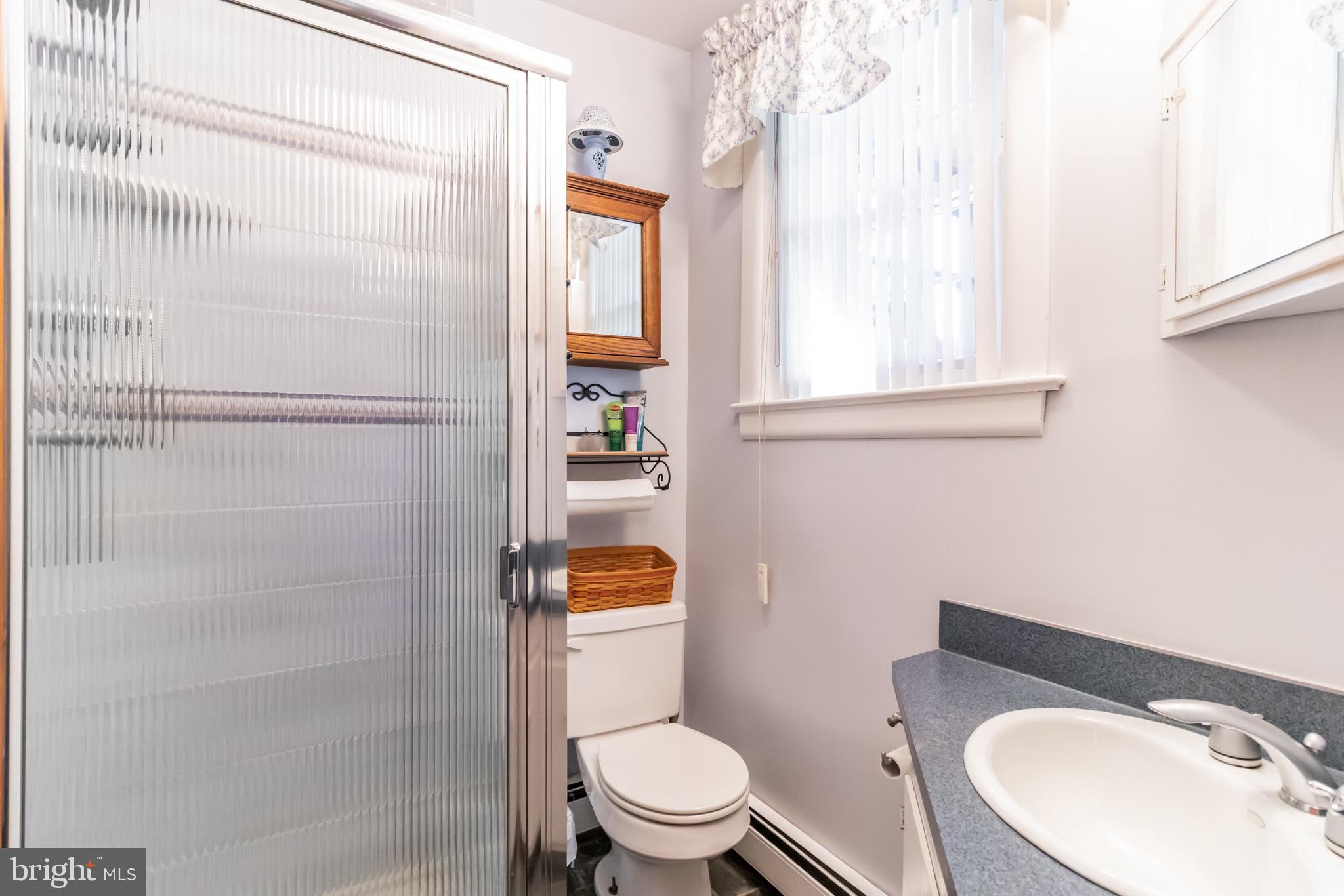 2441 Appleton Road Elkton, MD 21921 - Photo 11 of 32 a white toilet sitting next to a bathroom sink