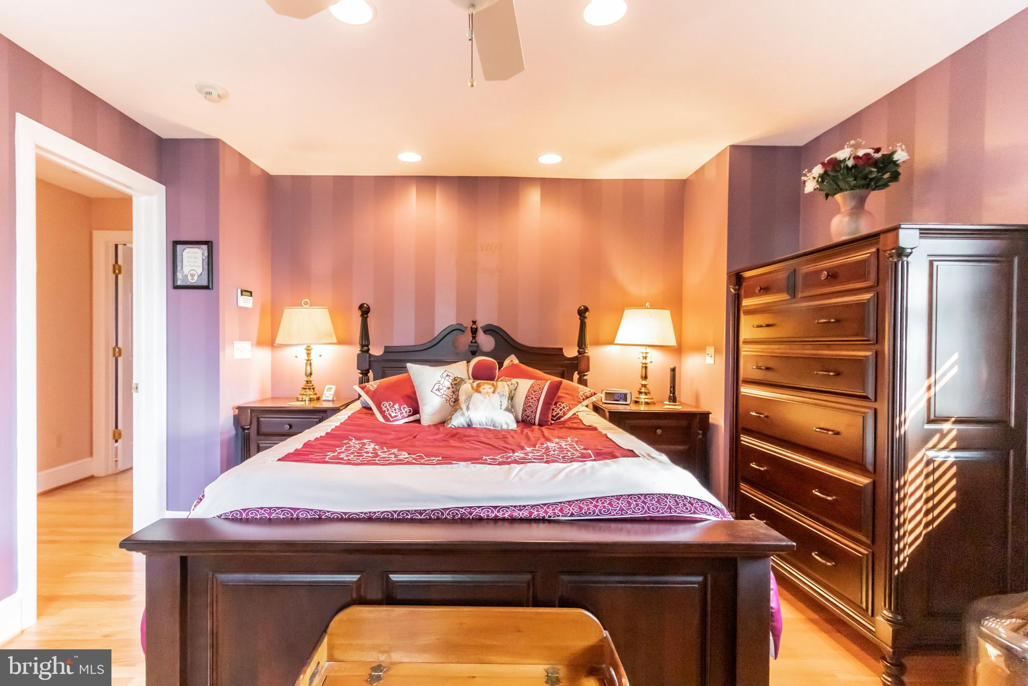 2441 Appleton Road Elkton, MD 21921 - Photo 13 of 32 a room with a bed and a refrigerator