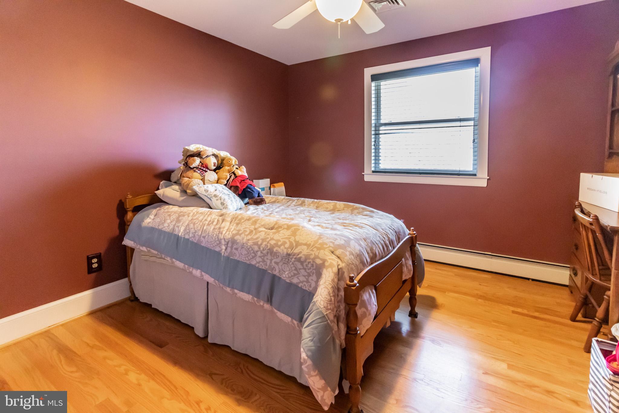 2441 Appleton Road Elkton, MD 21921 - Photo 15 of 32 a bedroom with a bed and a window