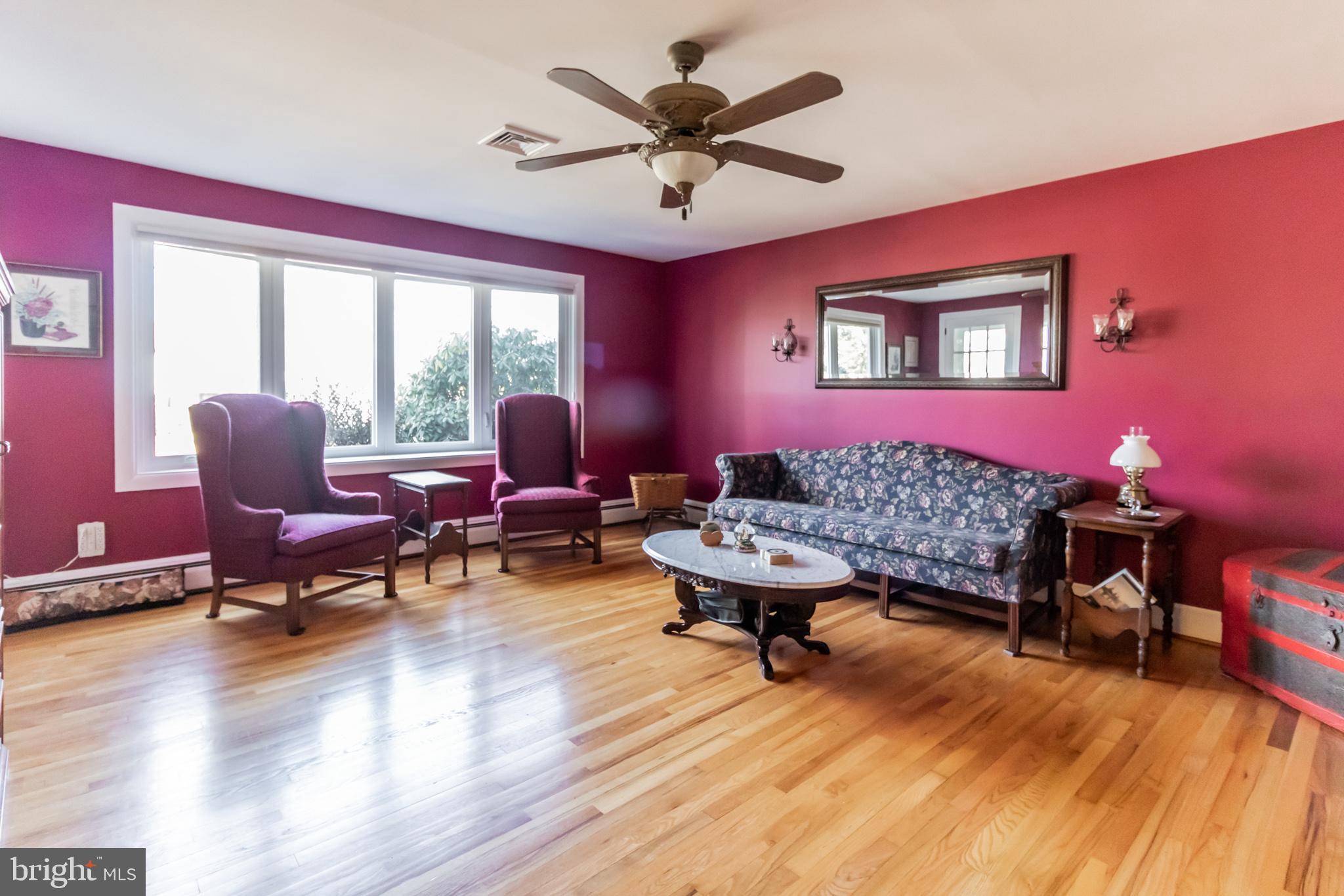 2441 Appleton Road Elkton, MD 21921 - Photo 4 of 32 a living room with furniture and wooden floor
