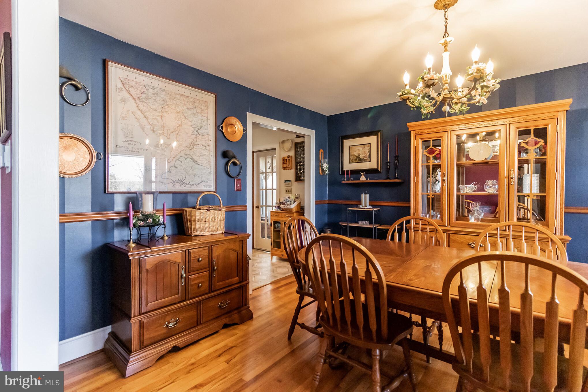 2441 Appleton Road Elkton, MD 21921 - Photo 6 of 32 a view of a dining room with furniture and chandelier