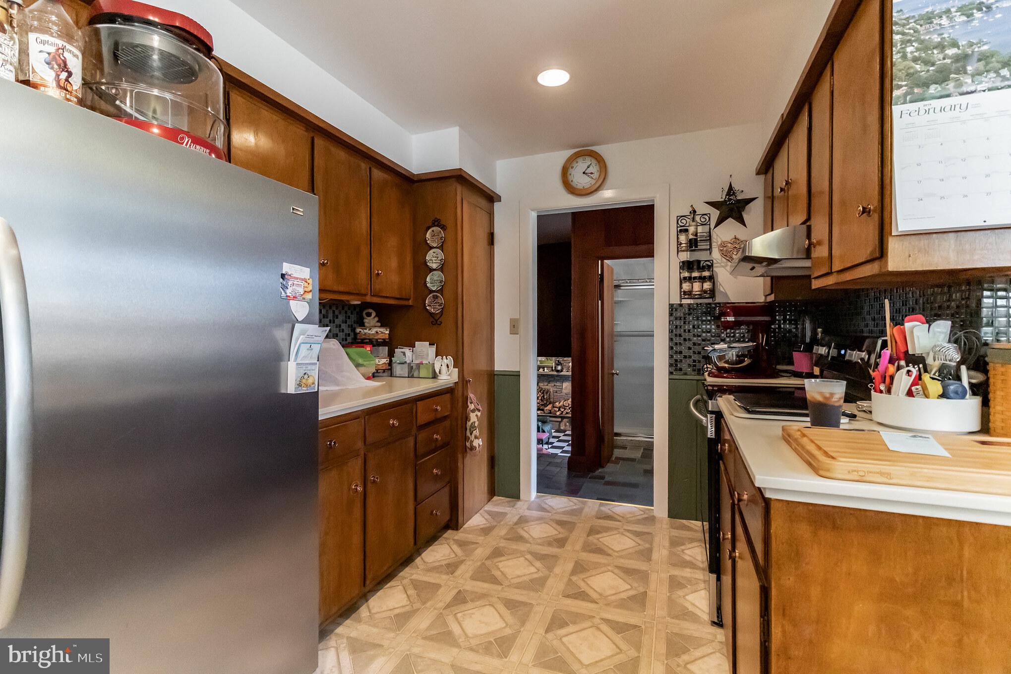 2441 Appleton Road Elkton, MD 21921 - Photo 9 of 32 a kitchen with stainless steel appliances granite countertop a refrigerator and a sink