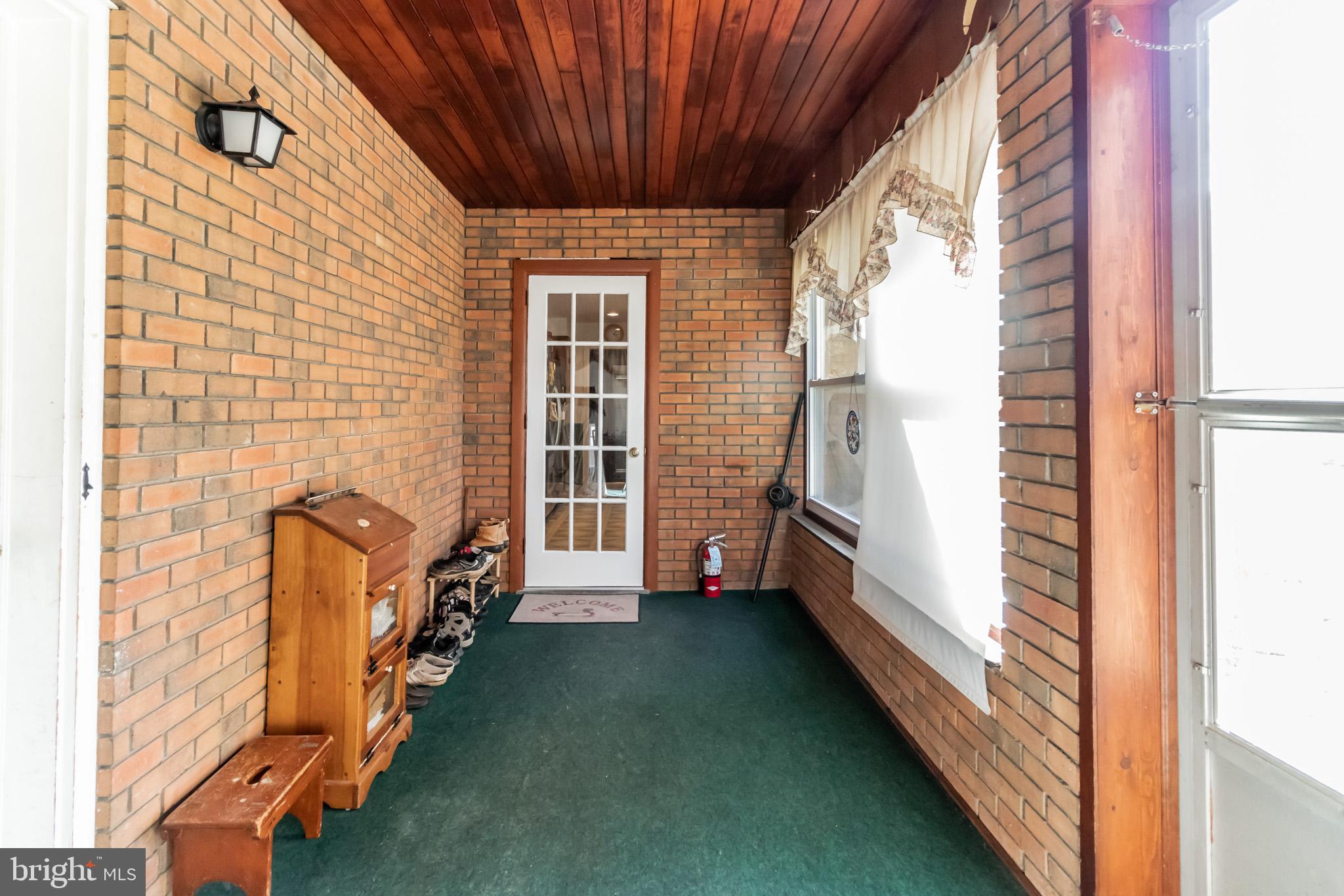 2441 Appleton Road Elkton, MD 21921 - Photo 10 of 32 a view of an entryway with wooden floor and door