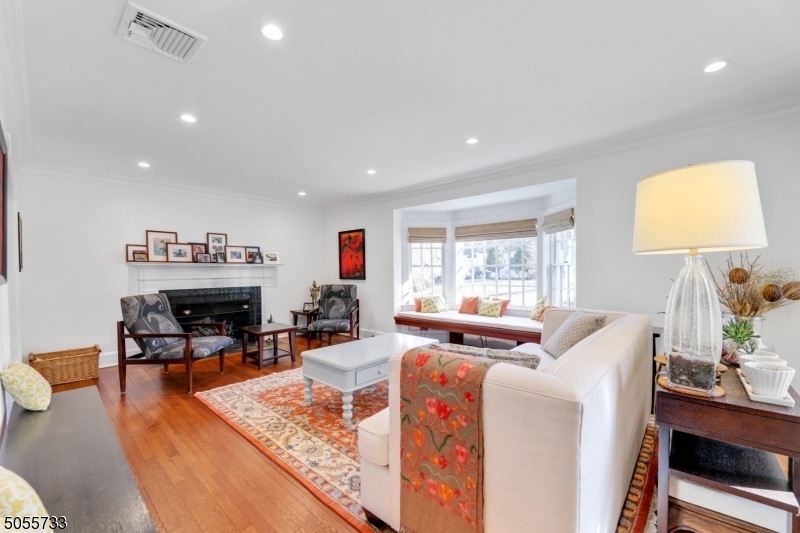 9 Hawthorne Road Short Hills, NJ 07078 - Photo 2 of 25 a living room with furniture and a large window