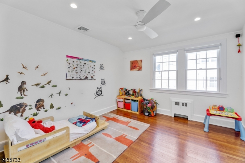 9 Hawthorne Road Short Hills, NJ 07078 - Photo 16 of 25 a playing room with toys and a wooden floor