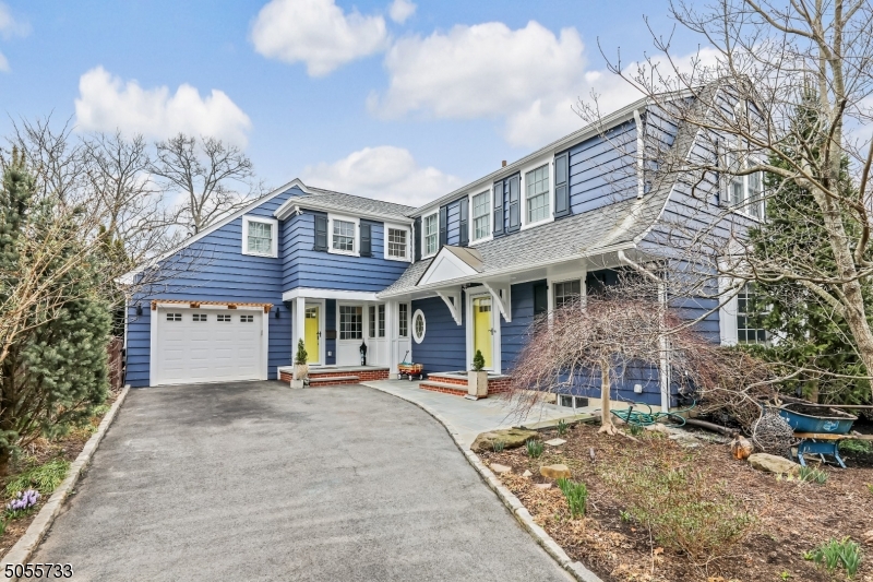 9 Hawthorne Road Short Hills, NJ 07078 - Photo 25 of 25 a front view of a house with a yard