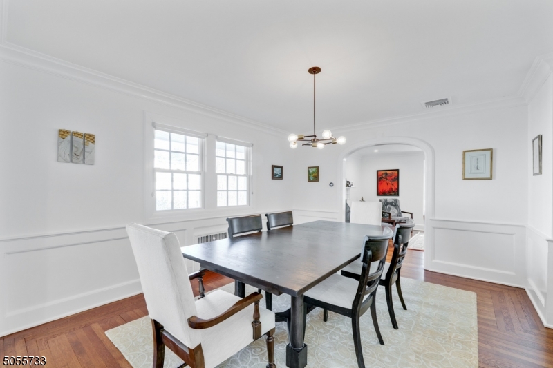 9 Hawthorne Road Short Hills, NJ 07078 - Photo 4 of 25 a view of a dining room with furniture window and wooden floor