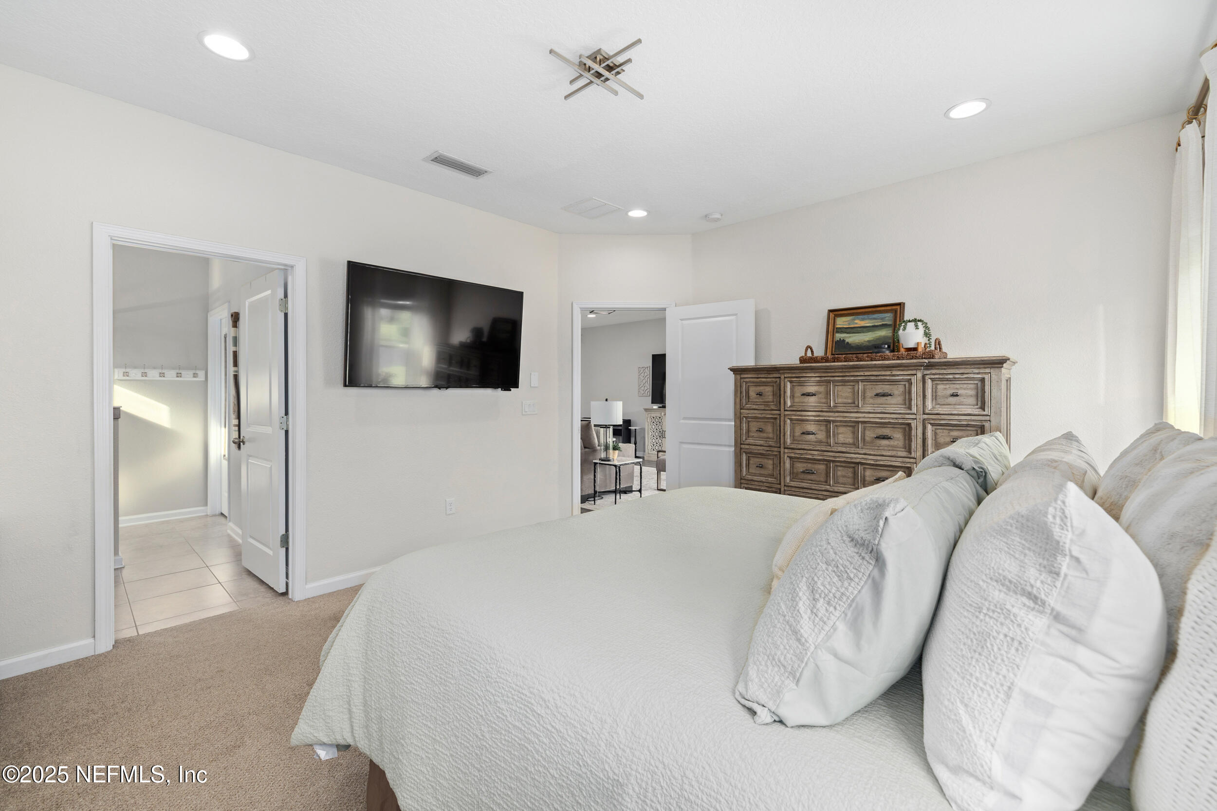 111 Beam Lane St. Augustine, FL 32095 - Photo 19 of 46 a bed room with a bed and a television