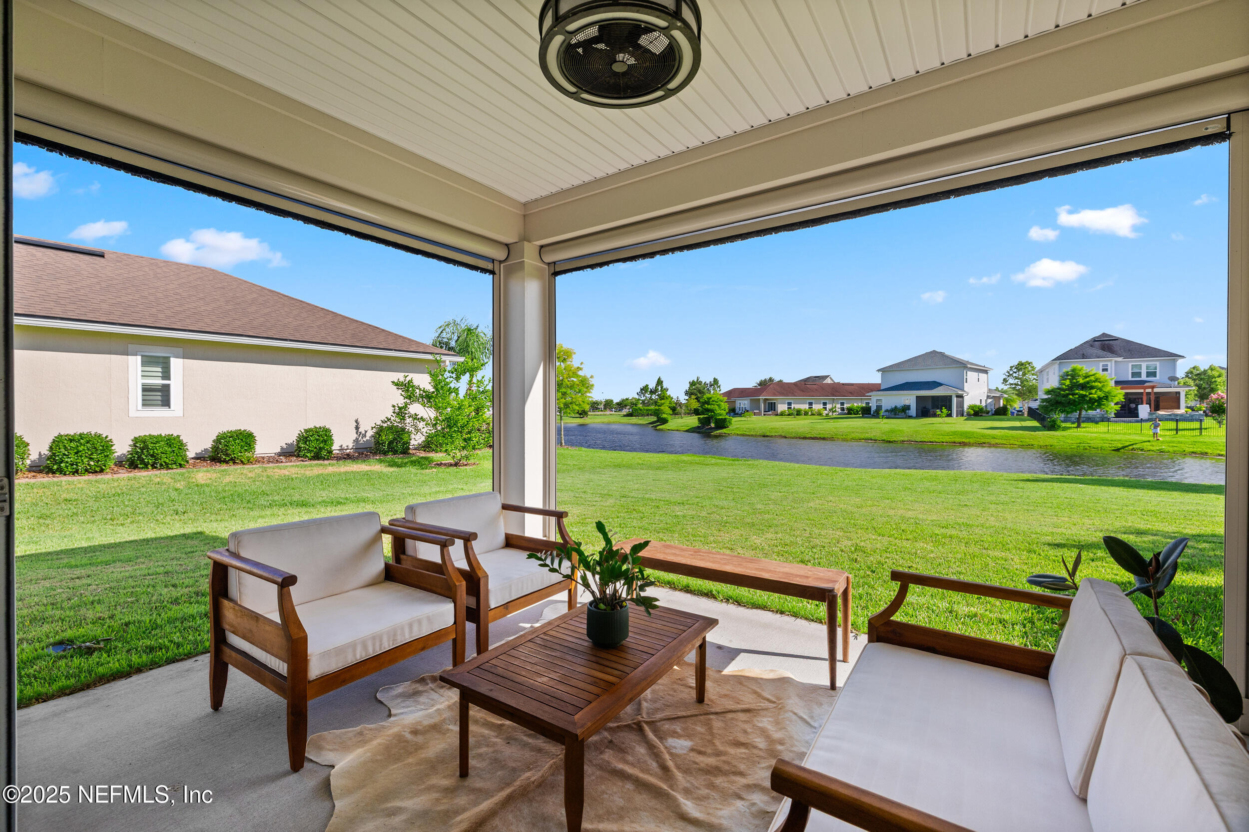 111 Beam Lane St. Augustine, FL 32095 - Photo 33 of 46 a view of swimming pool with outdoor seating and a garden