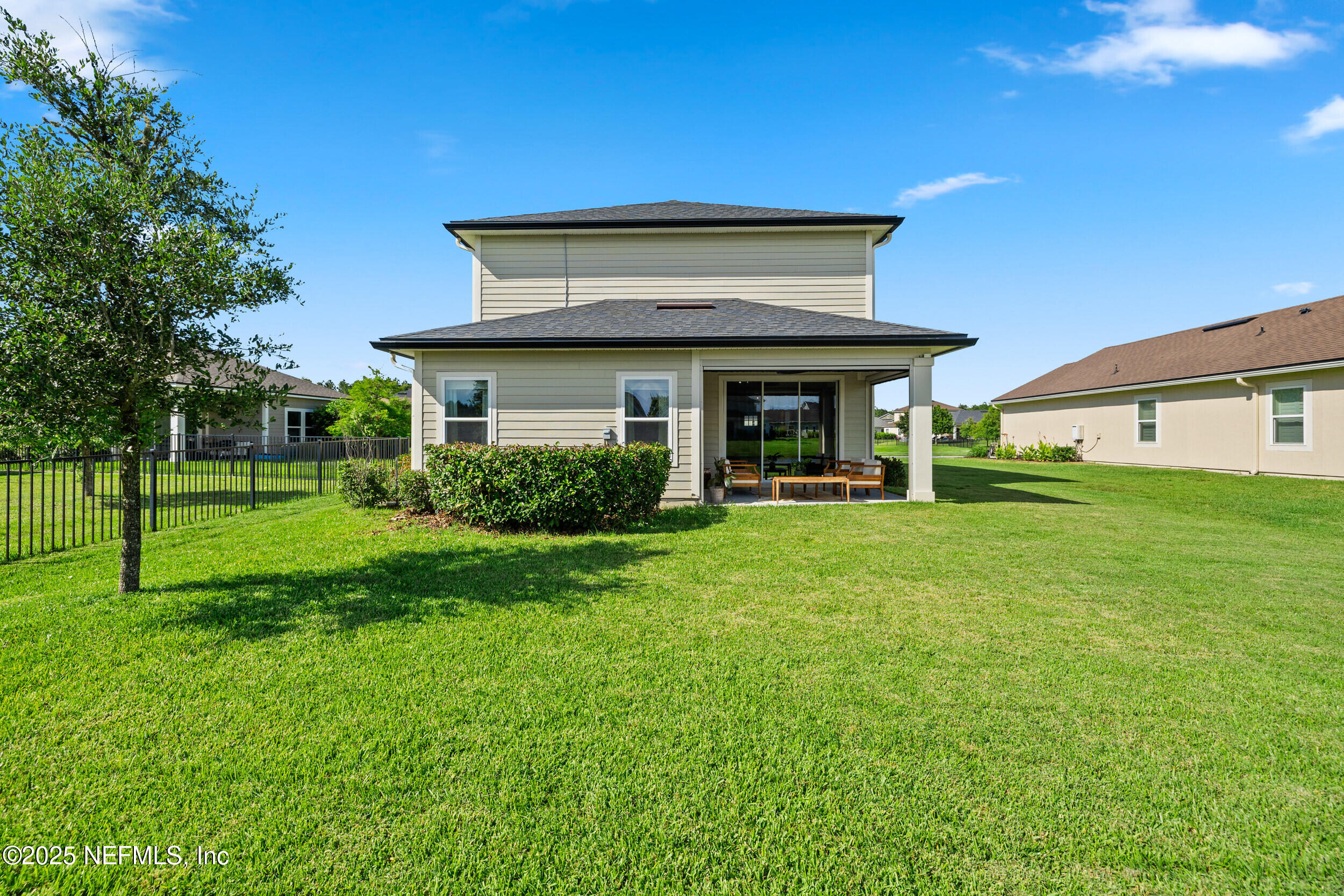 111 Beam Lane St. Augustine, FL 32095 - Photo 37 of 46 a view of a house with a yard