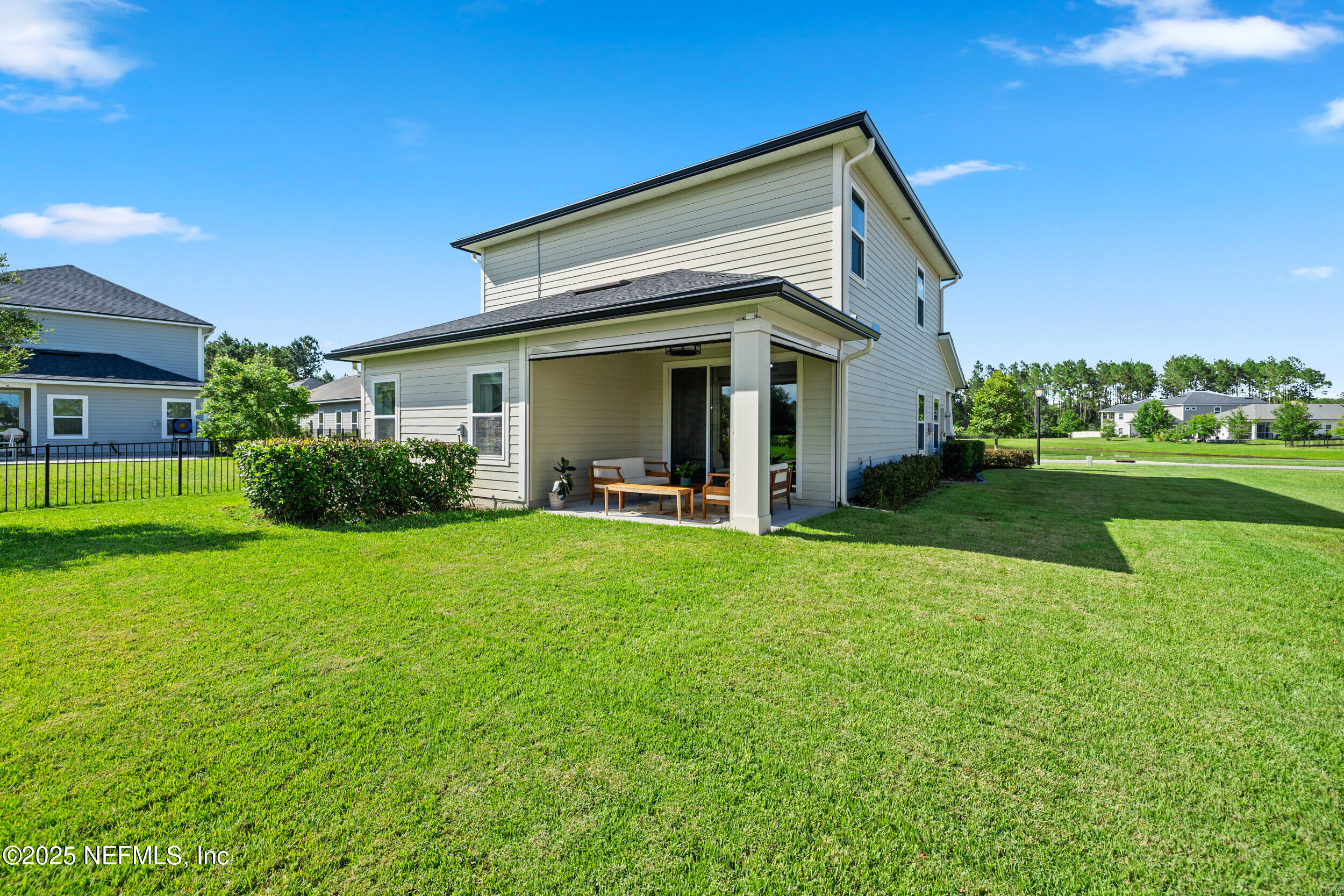 111 Beam Lane St. Augustine, FL 32095 - Photo 38 of 46 a view of a house with backyard and porch