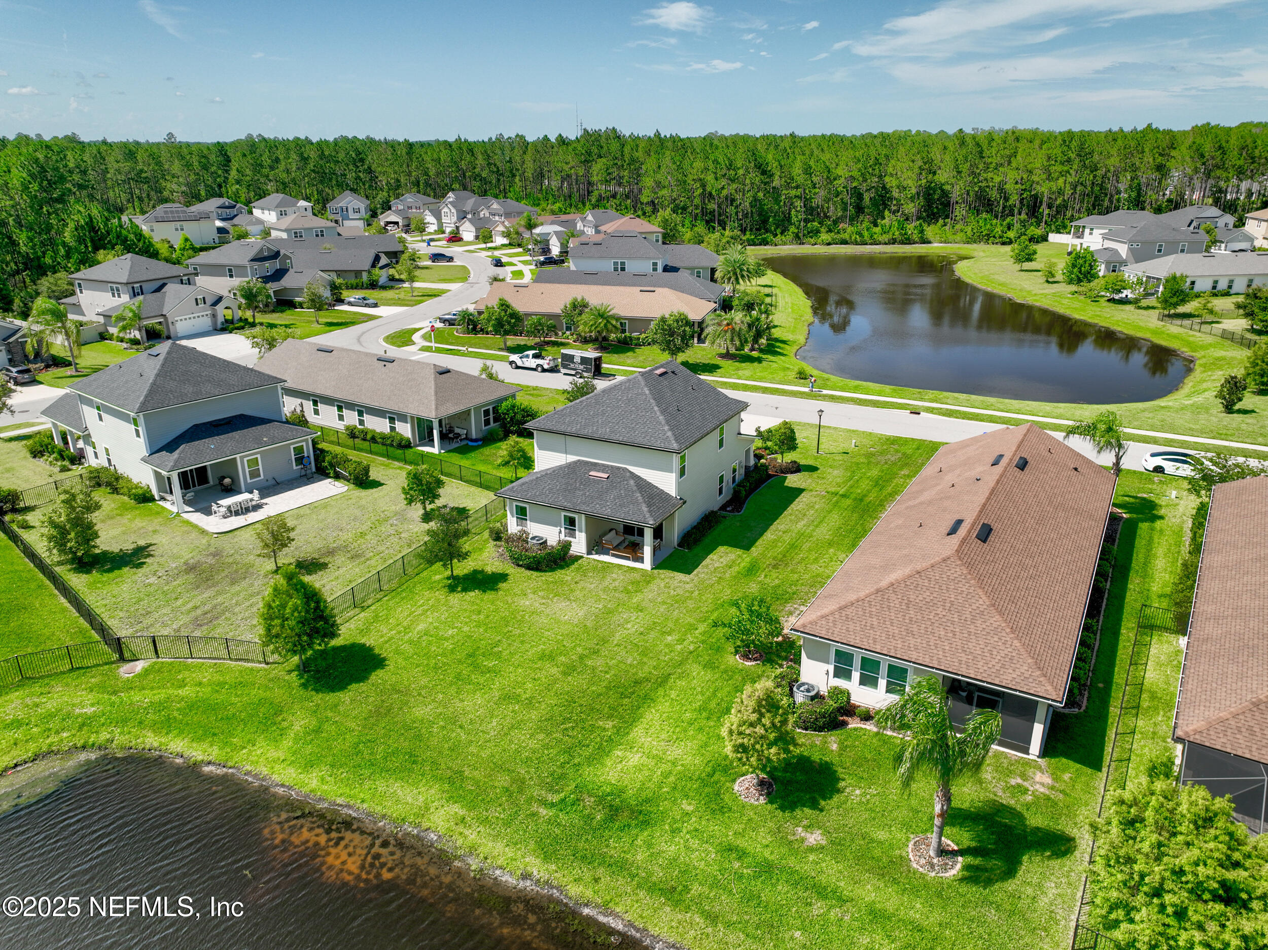 111 Beam Lane St. Augustine, FL 32095 - Photo 43 of 46 a view of a lake with a yard