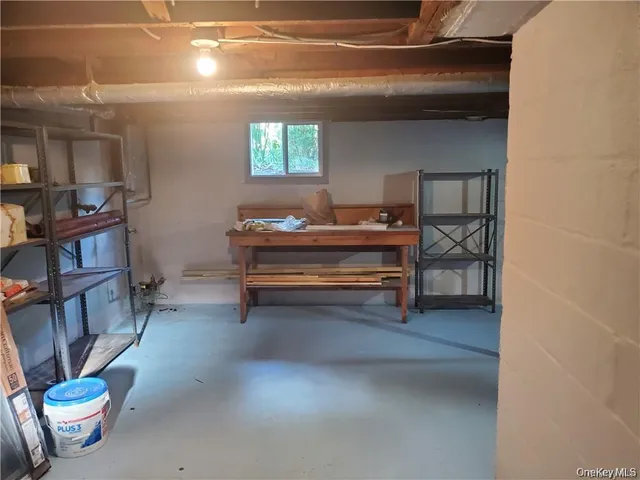 a view of livingroom with furniture and toys