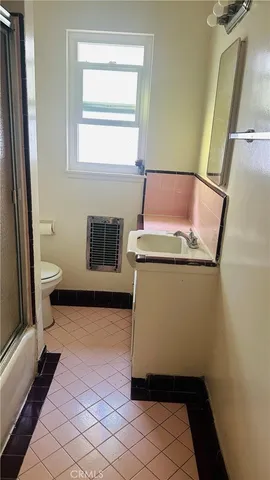 a bathroom with a sink and a toilet