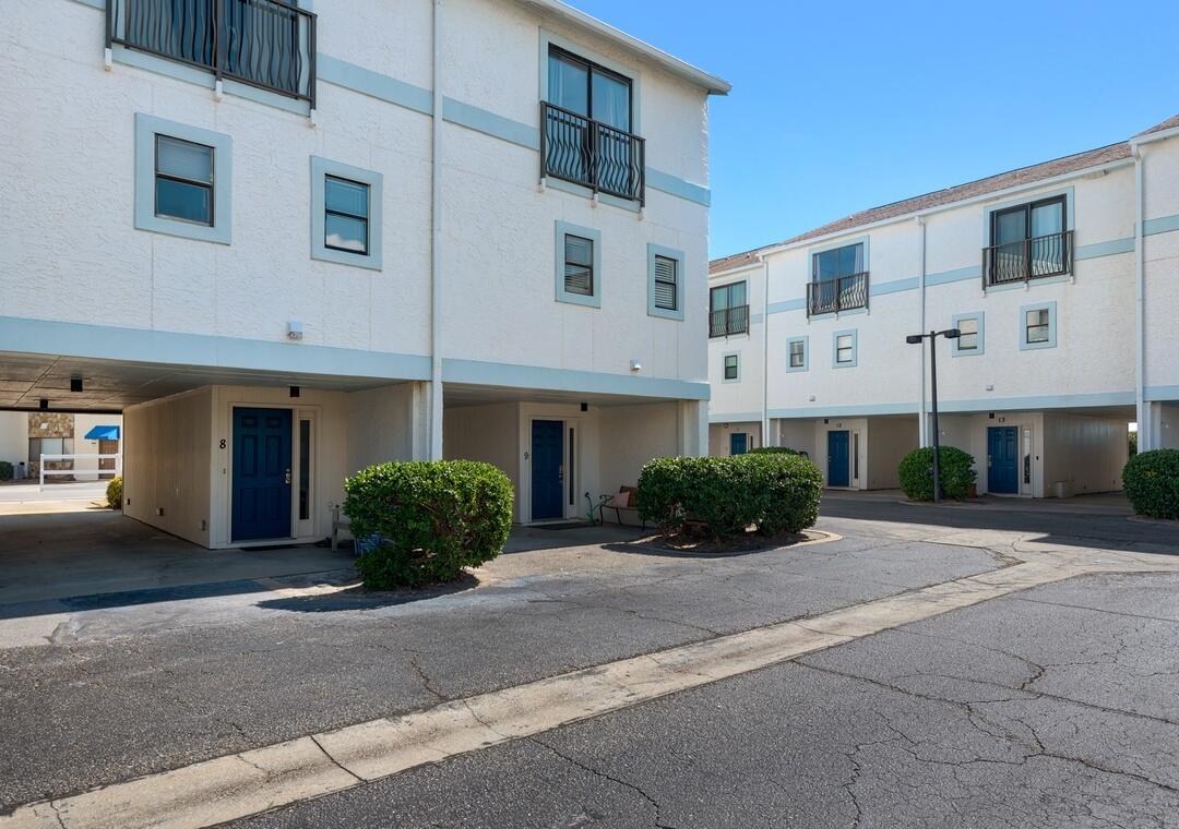 11 Driftwood Road, Unit 9 Miramar Beach, FL 32550 - Photo 29 of 30 a front view of a building with a garden