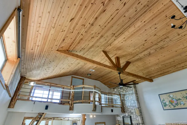 a view of a swimming pool with seating space