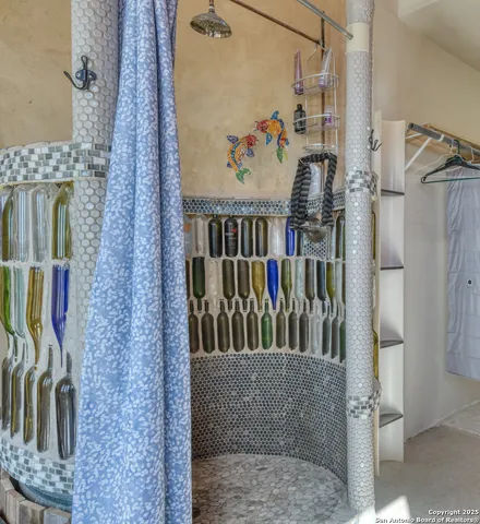 a view of a chairs and table in the patio