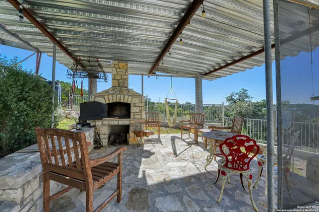 a patio with patio lots of furniture and outdoor seating