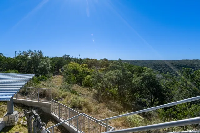 a view of a balcony with an outdoor space