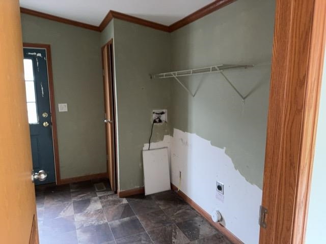1335 Big Noise Pit Road Two Harbors, MN 55616 - Photo 6 of 20 Laundry room featuring electric dryer hookup, crown molding, washer hookup, and baseboards