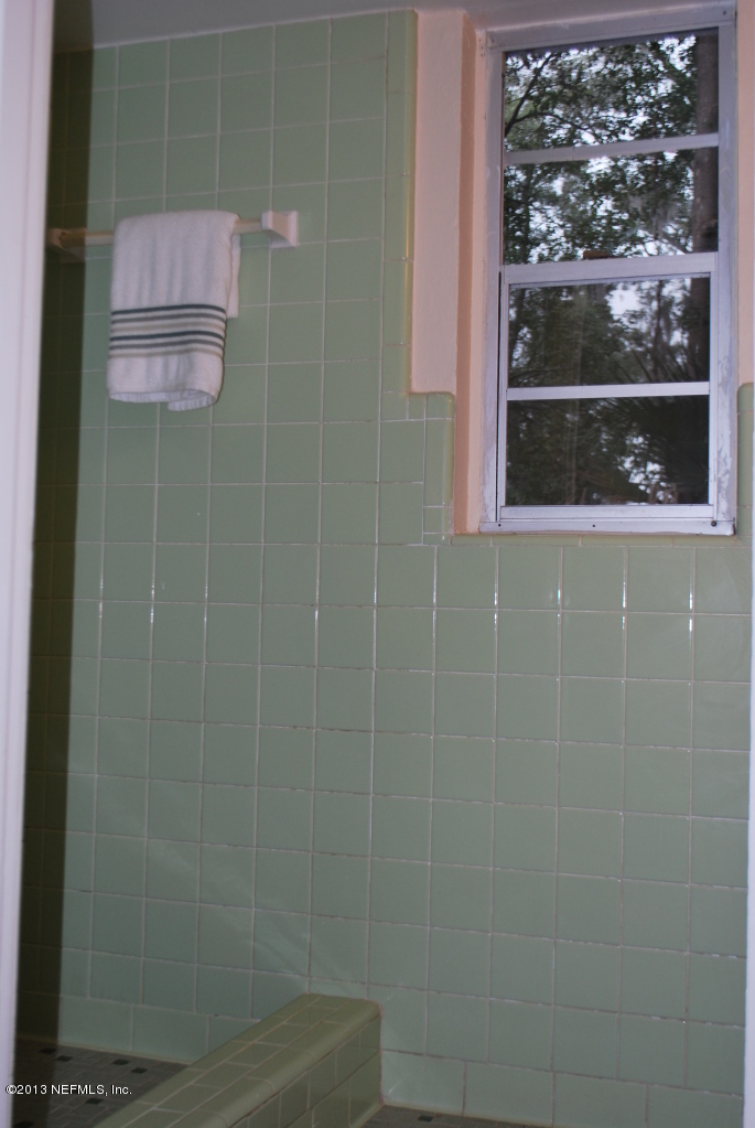 2915 Christopher Road Jacksonville, FL 32217 - Photo 13 of 26 a bathroom with a shower