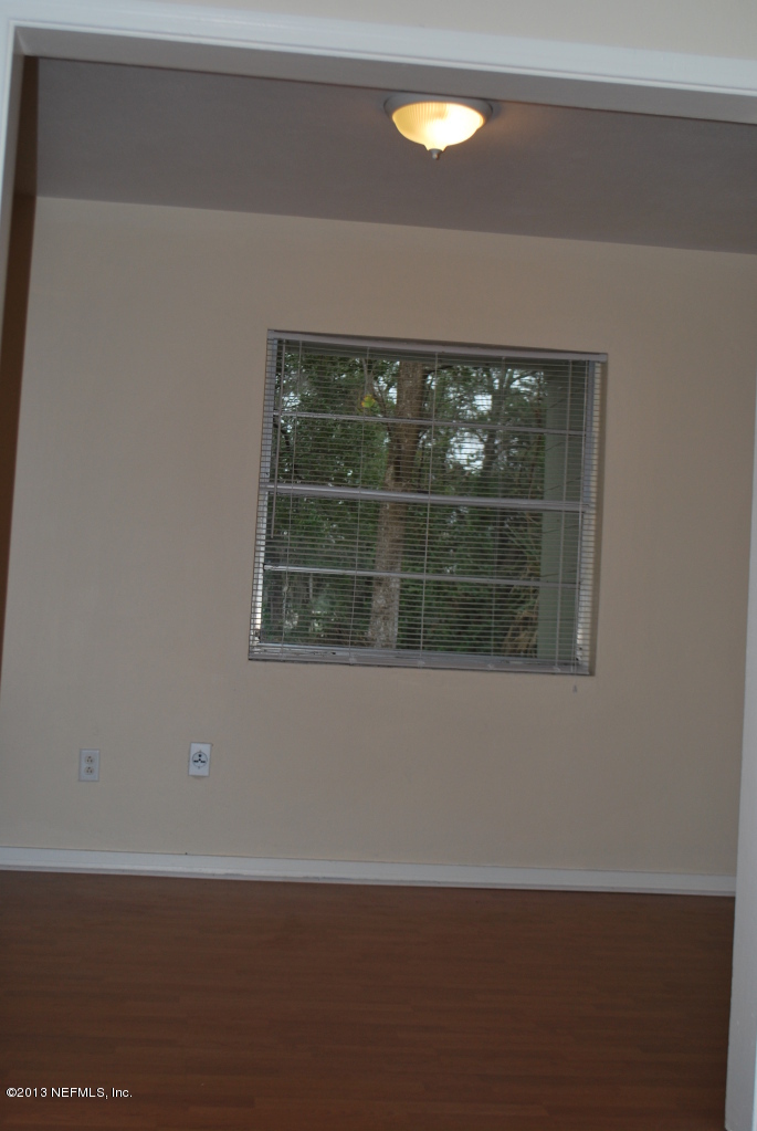 2915 Christopher Road Jacksonville, FL 32217 - Photo 5 of 26 a view of wooden floor and a window
