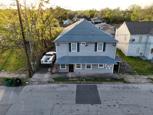 3522 Sampson Street Houston, TX 77004 - Photo 1 of 18 a front view of a house with a yard and garage