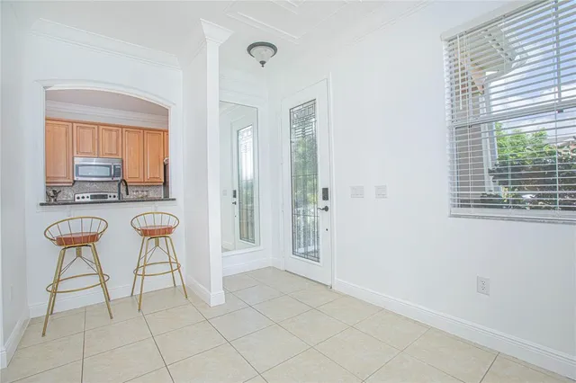 a view of a livingroom with table and chair