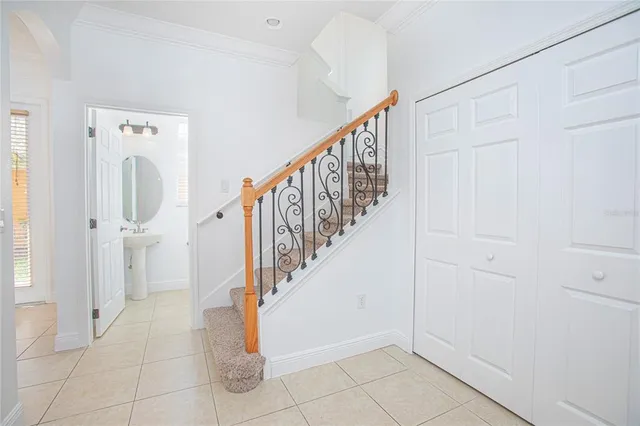 a view of entryway and hall with a rug