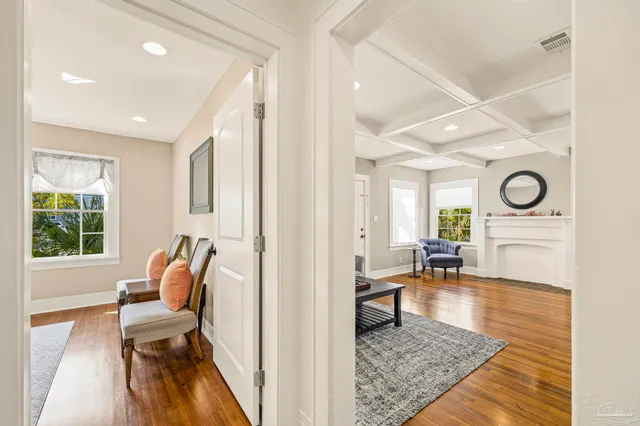 a living room with furniture and a rug
