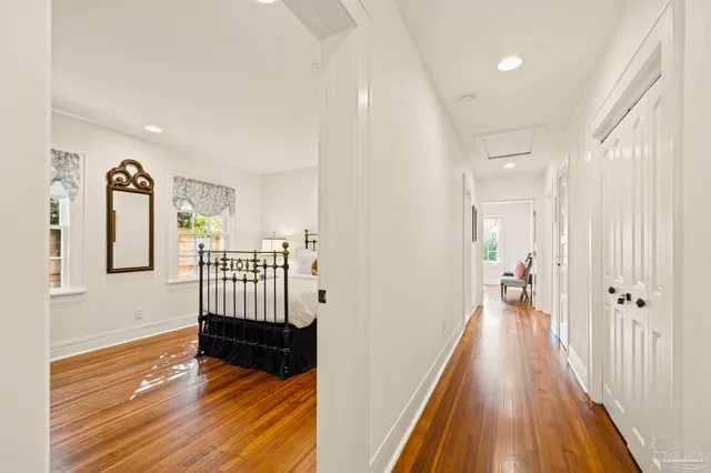 wooden floor in a hall with an entryway